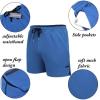 imageCOOFANDY Mens 2 Pack Gym Workout Shorts Quick Dry Athletic Shorts 5 Inch Lightweight Sports Running Shorts with PocketsOrangeBlue