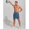 imageCOOFANDY Mens Athletic Running Shorts 7 Gym Workout Shorts Lightweight Drawstring Training Shorts with Zipper PocketsBlueNavy Blue