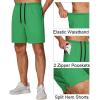 imageCOOFANDY Mens Athletic Running Shorts 7 Gym Workout Shorts Lightweight Drawstring Training Shorts with Zipper PocketsGreenBlack