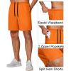 imageCOOFANDY Mens Athletic Running Shorts 7 Gym Workout Shorts Lightweight Drawstring Training Shorts with Zipper PocketsRoyal BlueOrange