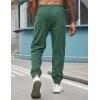 imageCOOFANDY Mens Corduroy Pants Casual Drawstring Trousers Elastic Waist Fashion Tapered Streetwear Joggers with PocketsPeacock Green