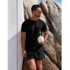 imageCOOFANDY Mens Swim Shirt Short Sleeve UPF 50 Sun Protection Shirt Rah Guard Athletic Quick Dry T ShirtsBlacknavy Blue