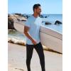 imageCOOFANDY Mens Swim Shirt Short Sleeve UPF 50 Sun Protection Shirt Rah Guard Athletic Quick Dry T ShirtsBlue