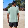 imageCOOFANDY Mens Swim Shirt Short Sleeve UPF 50 Sun Protection Shirt Rah Guard Athletic Quick Dry T ShirtsLight Green