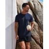 imageCOOFANDY Mens Swim Shirt Short Sleeve UPF 50 Sun Protection Shirt Rah Guard Athletic Quick Dry T ShirtsMightnight Blue