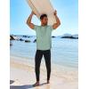 imageCOOFANDY Mens Swim Shirt Short Sleeve UPF 50 Sun Protection Shirt Rah Guard Athletic Quick Dry T ShirtsTeal