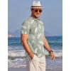 imageCOOFANDY Mens Henley Shirts Band Collar Short Sleeve Shirt Casual Summer Beach Shirt Hippie T Shirt Fashion Hawaiian ShirtGreen Palm Leaves