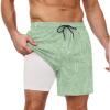 imageCOOFANDY Men Swim Trunk with Compression Liner 2 in 1 Swimwear Bathing Suit Quick Dry Board ShortPrint Green Leaves