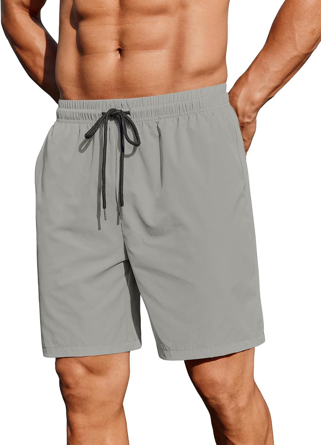imageCOOFANDY Mens 2 Pack Gym Workout Shorts 7 Inch Lightweight Athletic Shorts Quick Dry Running Shorts with PocketsLight GreyDark Green