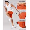 image:imageCOOFANDY Mens Athletic Running Shorts 9 Lightweight Quick Dry Drawstring Mesh Gym Shorts with Zipper PocketsVibrant Orange