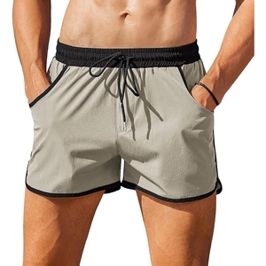image:imageCOOFANDY Mens Swim Trunks Quick Dry Swimsuit Color Block Board Short Bathing Suit Swimwear with Mesh LinerLight Grey