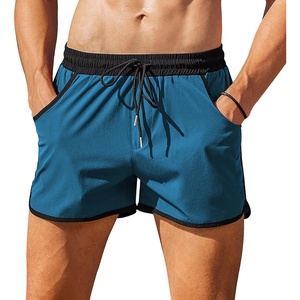 image:imageCOOFANDY Mens Swim Trunks Quick Dry Swimsuit Color Block Board Short Bathing Suit Swimwear with Mesh LinerW Light Blue