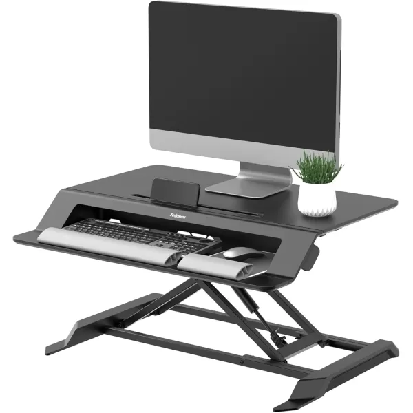 Fellowes Corsivo Height Adjustable Standing Desk Sit to Stand Gas Spring Riser Converter Tabletop Workstation Desk Riser 8091001Lotus LT