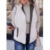 imageSHEWIN Women Puffer Vest Casual Stand Collar Sleeveless Puffer Jacket Warm Winter Reversible Zip Up Outerwear with PocketsDark Grey