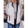 imageSHEWIN Women Puffer Vest Casual Stand Collar Sleeveless Puffer Jacket Warm Winter Reversible Zip Up Outerwear with PocketsNavy Blue