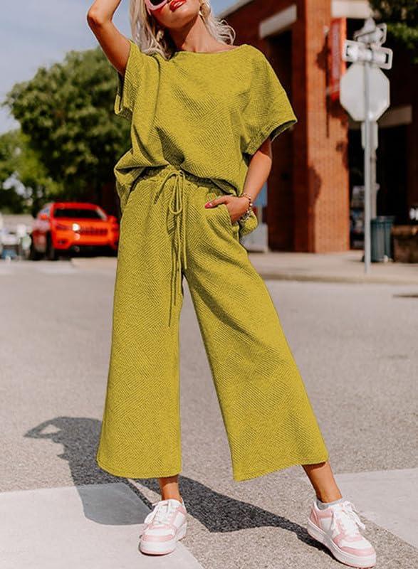 imageSHEWIN Womens 2 Piece Outfits Sweatsuit Casual Short Sleeve Pullover Tops and Drawstring Wide Leg Pants Lounge SetsYellow