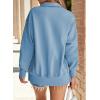 imageSHEWIN Womens Reverse Seam SnapButton Henley Sweatshirt Casual Loose High Low Split Pullover TopsLight Blue