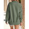imageSHEWIN Womens Reverse Seam SnapButton Henley Sweatshirt Casual Loose High Low Split Pullover TopsMoss Green