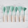 imageGreenLife Cooking Tools and Utensils 7 Piece Nylon and Wood Kitchen Set with Ceramic Crock Holder Heat Resistant Spatula and Spoons BPAFree BlackTurquoise
