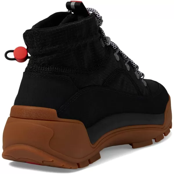 Hunter Travel Explorer Boots for Men Offers Rubber Upper, Polyester Lining, and Removable Cushioned Footbed
