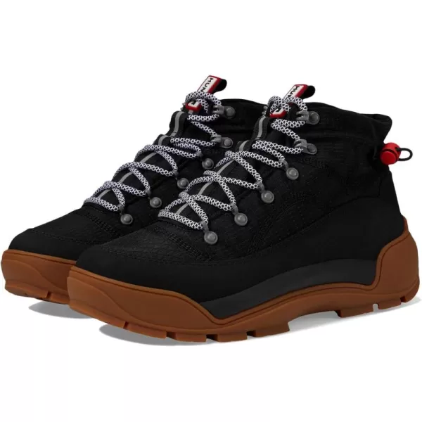 Hunter Travel Explorer Boots for Men Offers Rubber Upper, Polyester Lining, and Removable Cushioned Footbed