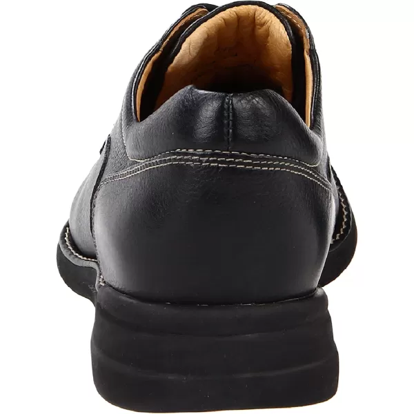 imageJohnston amp Murphy Mens Shuler Moc Toe SlipOn Shoe  Cushioned Footbed  FullGrain Leather  Rubber Sole  Padded Collar  Superior ComfortBlack Tumbled Calf