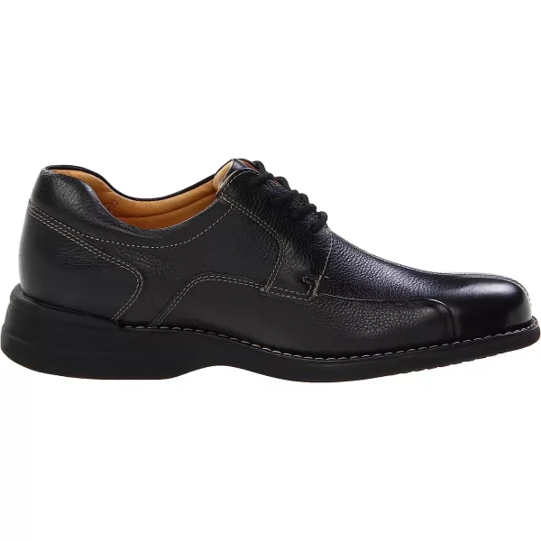 imageJohnston amp Murphy Mens Shuler Moc Toe SlipOn Shoe  Cushioned Footbed  FullGrain Leather  Rubber Sole  Padded Collar  Superior ComfortBlack Tumbled Calf