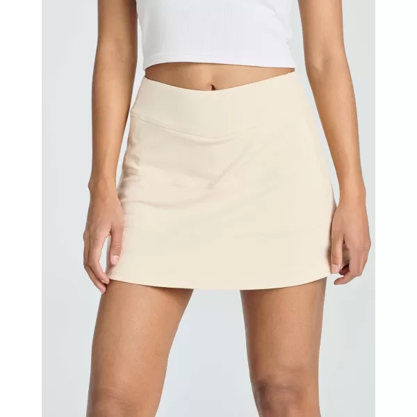 Real Essentials 3 PackWomens Pleated Tennis Skorts Golf Skirt for Woman High Waisted Lightweight Athletic Shorts PocketsSet 2