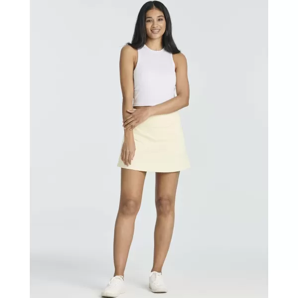 Real Essentials 3 PackWomens Pleated Tennis Skorts Golf Skirt for Woman High Waisted Lightweight Athletic Shorts PocketsSet 3