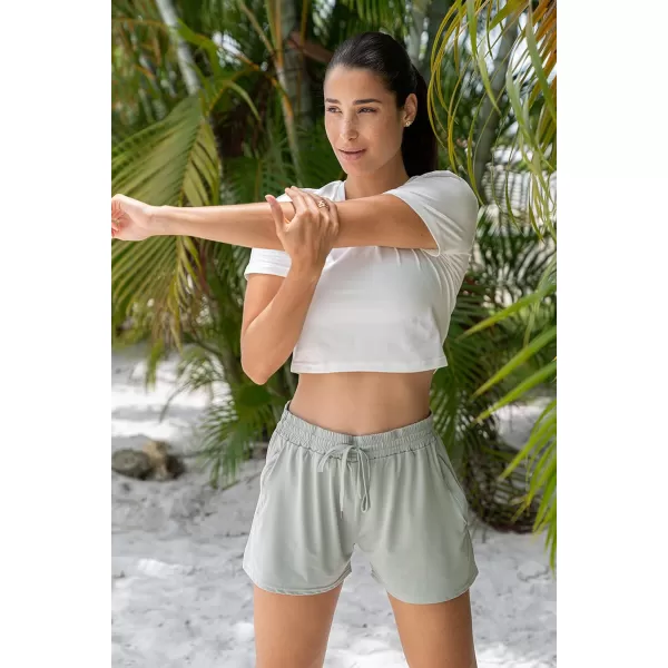 Real Essentials 4 Pack Womens Active Athletic Performance DryFit Shorts with Zipper Pockets Available in Plus SizeSet 4