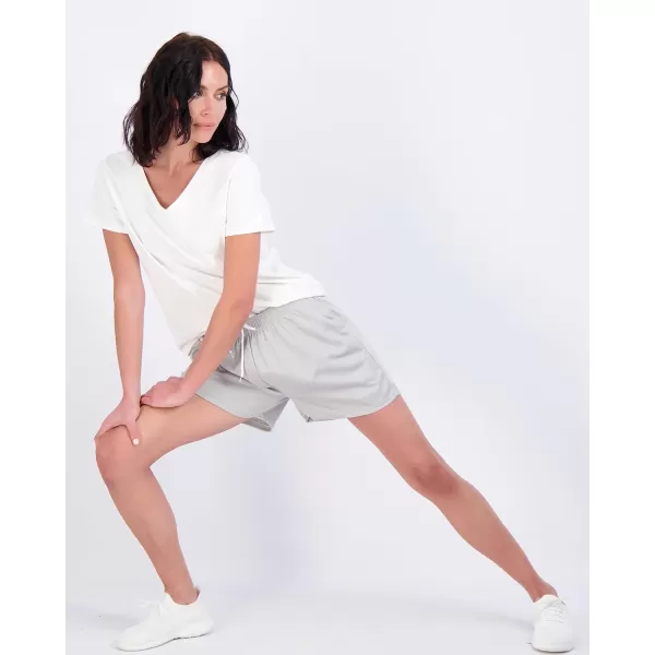 Real Essentials 4 Pack Womens Active Athletic Performance Mesh Shorts with Pockets Available in Plus SizeSet E