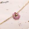 imageWrangler Gold Choker Necklace for Women Statement 14K Plated Bead Daisy Flower Charm Chains JewelryPink