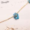 imageWrangler Gold Choker Necklace for Women Statement 14K Plated Bead Daisy Flower Charm Chains JewelryTurquoise