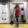 imageHover1 Helios Electric Folding Scooter 18 MPH Top Speed 24 Mile Range 500 Watts Max Power 10 Pneumatic Tires Rear Disc Brakes and Dual Front SuspensionBlue